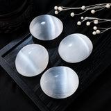 Small selenite palm stone